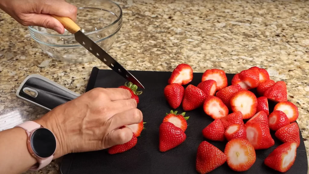 cutting the strawberries 